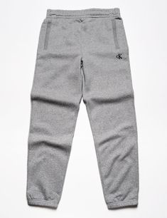 Full length flat shot of Calvin Klein Archive Logo Fleece Jogger - Heroic Heather Gray Cotton Joggers With Logo Waistband For Jogging, Cotton Sweatpants With Logo Waistband For Sports, Cotton Bottoms With Logo For Loungewear, Casual Sweatpants With Logo Waistband For Streetwear, Casual Streetwear Sweatpants With Logo Waistband, Casual Cotton Joggers With Logo Waistband, Casual Joggers With Logo Waistband For Sports, Sporty Logo Sweatpants For Streetwear, Casual Logo Pants For Streetwear