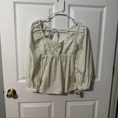 Size Xxs Open Edit Ivory Blouse 100% Cotton. New With Tags Retails For $65.00 A Little Wrinkled From Being Stored, But Nothing An Iron Or Steaming Couldn’t Fix Chic Winter White Cotton Tops, Chic Spring Tops In Winter White, Neutral Cotton Top For Brunch, Off White Cotton Top For Brunch, White Lace Tank Top, Hippie Blouse, Ivory Blouse, Bell Sleeve Shirt, Haute Hippie