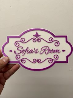 someone is holding up a sign that says sepia's room in purple and white