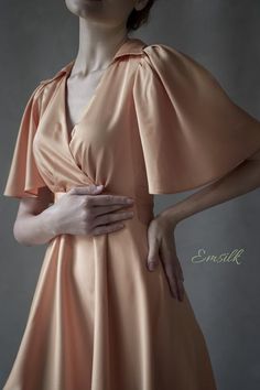 This luxury exclusive design midi dress is perfect for any events outfit or casual work outfit.100 % designed and handmade by Emsilk. I am pleased to offer your garments made to measure at no extra cost. All of my designs can be made in any colors that you see in my shop.Link to all colors in pure silk: https://www.etsy.com/shop/emsilkdesign?ref=seller-platform-mcnav&section_id=28483599* Detail: - V neckline wrapped- Pleated detail on waist- Small collar- Fully lined- Puffed sleeves- Invisib Chic A-line Wrap Dress For Formal Occasions, Elegant A-line Wrap Dress For Evening, Elegant A-line Maxi Dress For Office, Elegant Solid V-neck Midi Dress, Elegant V-neck Maxi Dress For Office, Elegant Solid Color Wrap Dress For Party, Elegant Short Sleeve Maxi Dress For Office, Elegant Solid Color Party Wrap Dress, Feminine Short Sleeve Party Wrap Dress