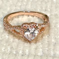 Sterling Silver 925 Heart Infinity Cz 6x6mm Ring Halo Heart Infinity Rose Gold Cz. Cubic Zirconia Ring. *Center Stone: 6mm Finish: Rose Gold Plated & Rhodium For Anti Tarnish. *Stamp: 925 *Brand New *Free Giftbox Included *Excellent Quality Rose Gold Cubic Zirconia Heart Cut Diamond Ring, Dainty Rose Gold Heart Ring With Cubic Zirconia, Rose Gold Cubic Zirconia Heart Ring For Wedding, Rose Gold Cubic Zirconia Heart Ring For Promise, Rose Gold Heart Cut Cubic Zirconia Heart Ring, Heart-shaped Rose Gold Promise Ring, Rose Gold Heart Ring With Cubic Zirconia, Heart-shaped Rose Gold Diamond Promise Ring, Modern Silver Ring