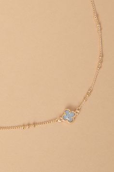 Adorned with a delicate clover charm, this choker necklace adds a touch of sophistication to any ensemble, creating beauty in a subtle and captivating manner. This is a timeless accessory that effortlessly complements your style. Charm Choker Necklace, Clover Charm, Clover Necklace, Accessories Jewelry Necklace, Timeless Accessories, Altar'd State, Blue Gold, Your Style, Jewelry Necklace Pendant