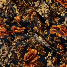 an image of a black and orange floral print fabric with gold, red, and yellow flowers