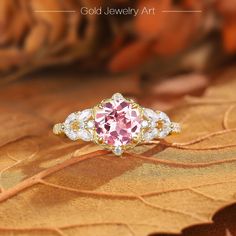 💎 Stone Specifications: 🌟 Main Stone: Pink Sapphire 🌟 Side Stones: Moissanite 🌟 Size of Main Stone: 6.5mm 🌟 Center Stone Carat: 1.5ct 🌟 Cut: Round cut 🔮 Materials Available: ＊ 925 Sterling Silver ＊ 925 Sterling Silver (Electroplated) ＊ 10K Gold ＊ 14K Gold ＊ 18K Gold ＊ Platinum 🎀 Contact us directly to customize your ring size or gemstone - bespoke services available upon request. 🎁 Packaging: Each ring is carefully placed in a beautifully curated gift box, ensuring a luxurious unboxing Rose Gold Topaz Ring With Accent Stones, Fine Jewelry Rose Gold Topaz Ring With Accent Stones, Exquisite Pink Round Diamond Ring, Elegant Pink Gold Rings With Accent Stones, Rose Gold Topaz Ring With Diamond Center Stone, Pink Gold Jewelry With Center Stone For Formal Occasions, Formal Pink Gold Jewelry With Center Stone, Round Pink Gold Diamond Ring, Pink Gold Round Diamond Ring