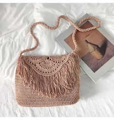 Bohemian Tassel Beach Bag, Women Crochet Fringed Crossbody Bag, Hand K – Elena Handbags Summer Beige Crochet Bag Made Of Yarn, Beach Crochet Bag With Tassels, Summer Handwoven Crochet Bag Made Of Yarn, Bohemian Crochet Bag With Fringe For Travel, Bohemian Summer Straw Bag With Fringe, Casual Crochet Fringe Bag For Travel, Spring Bohemian Beige Crochet Bag, Bohemian Straw Bag With Tassels For Beach Season, Bohemian Crochet Bag With Tassels For Travel