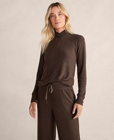 Haven Well Within. A thoughtful collection of lounge, sleep, home, and lifestyle essentials — and your trusted resource for all things wellbeing. A true classic, updated. Designed with a crossover neckline and contrasting diagonal ribbing that meets at a flattering center seam. All in a relaxed, casual silhouette. Mock neck. Long sleeves.,Hit:22 1/2" long,Imported:Imported,Fit:Hits at hip,Fabrication:74% LENZING™ ECOVERO™ Viscose, 23% Recycled Polyester, 3% Spandex,Garment Care:Machine Washable Haven Well Within Sweater Knit Crossover Mock Neck Top by Ann Taylor Size regular - 2XL Chocolate Women's Mock, Neck, Long, Sleeve, 74%, LENZING™, ECOVERO™, Viscose, 23%, Recycled, Polyester, 3%, Spandex, Machine, Washable Best Fall Sweaters Mock Neck Long Sleeve, Mock Neck Top, Fall Sweaters, Sweater Knit, Effortless Style, Mock Neck, Ann Taylor, Knitted Sweaters, Fashion Accessories