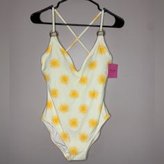 Kate Spade One Piece Swimsuit With Sun Pattern. -One Piece -Crisscross Straps -Cup Liners Kate Spade Swimwear For Pool In Spring, Kate Spade Swimwear For Spring Pool Occasions, Kate Spade Swimwear For Spring Pool, White Kate Spade Swimwear For Spring, White Cross Back Swimwear For Beach, Spring Swimwear With Crisscross Straps, Summer Swimwear With Crisscross Straps For Spring, Crisscross Swimwear For Spring And Summer, Spring Swimwear With Cross-tied Design