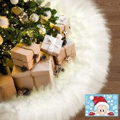 a christmas tree with presents under it on a fluffy white blanket next to a wooden floor