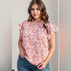 Features: Ruffled Sheer: Opaque Stretch: No Stretch Material Composition: 100% Polyester Care Instructions: Machine Wash Cold. Tumble Dry Low. Imported Product Measurements: 1x:Bust 46.46 In, Shoulder 15.75 In, Sleeve Length 4.53 In, Top Length 26.77 In 2x:Bust 49.61 In, Shoulder 16.61 In, Sleeve Length 4.72 In, Top Length 26.97 In 3x:Bust 52.76 In, Shoulder 17.48 In, Sleeve Length 4.92 In, Top Length 27.95 In Flutter Sleeve Top With Floral Print For Work, Printed Ruffle Sleeve Top For Day Out, Ruffle Sleeve Printed Top For Day Out, Floral Print Ruffle Sleeve Top For Work, Printed Flutter Sleeve Tops For Day Out, Workwear Tops With Floral Print And Ruffle Sleeves, Printed Cotton Top With Flutter Sleeves, Cap Sleeve Blouse, Cap Sleeves Blouse