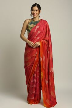 Red shadow print satin pre-draped saree. Paired with green jute blouse.
Component: 2
Pattern: Printed
Type Of Work: Shadow print
Neckline: Round
Sleeve Type: Sleeveless
Fabric: Satin, Jute
Color: Red,Green
Other Details: 
Embroidered hem
Closure: Back zipper blouse
Occasion: Party - Aza Fashions Festive Red Pre-draped Saree With Printed Motifs, Red Cotton Silk Pre-draped Saree With Unstitched Blouse, Fusion Style Silk Pre-draped Saree For Festivals, Festive Red Dupatta With Digital Print, Multicolor Silk Pre-draped Saree, Fusion Silk Blouse Piece For Festive Occasions, Fusion Style Festive Silk Blouse Piece, Red Silk Dupatta With Digital Print, Red Digital Print Dupatta For Navratri