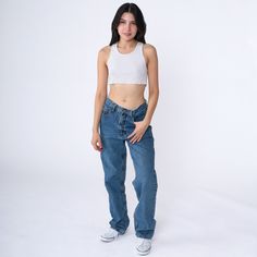 Vintage 90s jeans by Armani in blue denim with a high waist and a straight leg with a slight taper. Please see measurements and condition below. Every garment we sell is authentic vintage! You will receive the exact item photographed. Condition: Very good vintage. Best fits women's: Labelled 30 Tag: armani Material:  denim MEASUREMENTS Taken from seam to seam while the garment is lying flat. Double the armpit, waist, and hips For reference, model is 5'5" and measures 31-24-35. Waist: 15" Hips: 19.5" Inseam: 30" Rise: 11" For sales and promotions, follow us @Shopexile 90s Blue Straight Leg Cargo Jeans, 90s High Rise Denim Blue Cargo Jeans, 90s Style High Rise Denim Blue Cargo Jeans, 90s High Rise Denim Cargo Jeans, 90s Style High-rise Denim Blue Cargo Jeans, 90s Style Medium Wash Straight Leg Cargo Jeans, 90s Straight Leg Medium Wash Cargo Jeans, 90s Denim Blue Straight Leg Pants, 90s Style Straight Leg Cargo Jeans For Spring