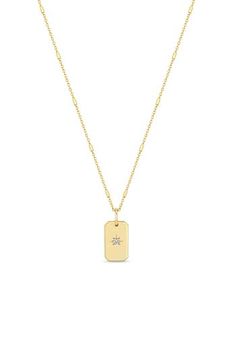 A starburst setting twinkles with a single diamond on the dog-tag pendant of this 14-karat-gold necklace. 16" length Total diamond weight: 0.02ct. Color: F–G Clarity: SI1–SI2 14k gold/diamond Made in the USA >Diamond Guide Dog Tag Pendant, Zoe Chicco, Diamond Guide, Jewelry Essentials, Modern Necklaces, Dog Tag, Dog Tags, Womens Jewelry Necklace, Gold Diamond