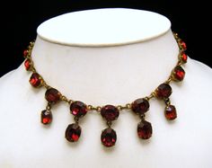 Gorgeous Vintage Red Rhinestone Necklace 5 Drops Gold Tone European? Marks-None.  Came from an Estate Lot where most of the jewelry was from France. The Necklace has a Wearable Length of 16 1/2" and The Drops are approximately 5/8" Long. Condition is Very Good with No Flaws and Some Wear or Aging to the Foiled Backs that is not at all Noticeable from the Front. Big Necklace, Garnet And Gold, Red Rhinestone, Choker Necklaces, Rhinestone Necklace, Antique Jewelry, Favorite Jewelry, Choker, Choker Necklace