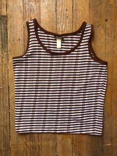 70s era boxy knit striped tank from Towncraft. Nice overall condition. Washed and ready to wear. See photos for measurements. Retro Ribbed Striped Tops, Retro Striped Ribbed Tops, Retro Brown Sleeveless Top, Striped Ribbed Cotton Tank Top, Vintage Ribbed Cotton Tops, Vintage Brown Knit Top, Vintage Sleeveless Brown Top, 70s Era, Knit Tank Top