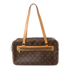 This is an authentic LOUIS VUITTON Monogram Cite GM. This chic shoulder bag is expertly crafted of classic Louis Vuitton monogram coated canvas. The bag features vachetta cowhide leather shoulder straps and trims with a front zipper pocket and polished brass hardware. The top zipper opens to an ivory microfiber interior with zipper and patch pockets. High-end Monogram Canvas Shoulder Bag For Formal Occasions, Elegant Monogram Canvas Shoulder Bag For Business, Luxury Formal Shoulder Bag In Signature Coated Canvas, High-end Formal Shoulder Bag In Signature Coated Canvas, Timeless Monogram Canvas Bag For Formal Occasions, Luxury Formal Shoulder Bag In Coated Canvas, Classic Formal Bags In Signature Coated Canvas, Formal Monogram Canvas Flap Shoulder Bag, Timeless Monogram Canvas Shoulder Bag For Formal Occasions