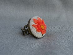 Embroidered ring with tangerine flower, best gift for women, round floral ring with cross stitch Traditional Handmade Flower Ring As Gift, Handmade Multicolor Flower Rings, Handmade Bohemian Flower Ring, Handmade Bohemian Orange Ring, Handmade Orange Rings As Gift, Handmade Orange Ring Jewelry, Handmade Orange Rings For Gifts, Bohemian Handmade Flower Rings, Handmade Bohemian Flower Ring As Gift