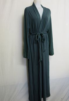 Kimono Style Bamboo Robe/Housecoat XL If you want comfortable this is it! Bamboo and a touch interlock  Cozy and soft, stretchy and flattering Easy care.. washes and packs like a dream Terrific to take you from the bedroom to the breakfast table Large/Extra Large EXCELLENT condition Made in USA 19" shoulder 50" bust 21" sleeve from underarm 58" long 71" circumference at hem Your new Favorite! https://www.etsy.com/shop/BelindasStyleShop Mode Kimono, Table Large, Pajama Robe, Kimono Style, Womens Robes, Kimono Fashion, Outfits For Teens, Forest Green, Favorite Outfit