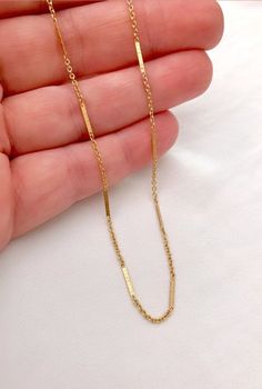 14k Gold Filled Flattened Bar Chain Necklace --- International Customers: Please be familiar with your country's policies in regards to customs fees prior to purchasing overseas. Any fees/taxes are the buyer's responsibility and may be charged at the time of delivery/pick-up. This is not included in the costs here. Thank you! This dainty, gold necklace is the piece of jewelry you can reach for on any occasion! Very subtle, yet eye catching! Features a 14k gold filled chain with a unique chain li Minimalist Chain Necklaces For Anniversary, Rectangular Links Clavicle Chain Jewelry For Gift, Clavicle Chain Jewelry With Rectangular Links As A Gift, Minimalist Link Chain Necklace For Anniversary, Simple Paperclip Chain Necklace As Gift, Simple Paperclip Chain Necklace Gift, Simple Cable Chain Jewelry Gift, Simple Cable Chain Jewelry As Gift, Minimalist Delicate Chain Necklace For Gifts