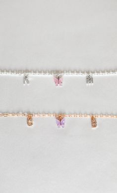 "A dainty personalized necklace featuring a colorful butterfly charm in between two crystal initials. Choose from peachy pink, turquoise blue, fuchsia pink, yellow, lavender, white, emerald green, ruby red, royal blue, jet black, and charcoal. Matching earrings: https://www.etsy.com/listing/693774042/colored-mariposa-butterfly-earrings-18k ✧ 1 gold plated necklace ✧ chain: 4mm curb (picture 2 & 5) or 3mm rolo (picture 1 & 4) ✧ lobster clasp closure ✧ nickel + lead free ✧ length: 16\"/40. Personalized Adjustable Butterfly Jewelry, Pink Personalized Dangle Necklaces, Personalized Pink Necklace, Trendy Pink Butterfly Necklace Gift, Trendy Pink Butterfly Necklace For Gift, Dainty Charm Necklaces With Letter Beads For Personalized Gift, Dainty Letter Beads Charm Necklace For Personalized Gift, Delicate Personalized Pink Jewelry, Pink Dainty Jewelry For Personalized Gifts