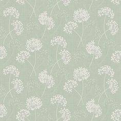 a light green wallpaper with white flowers on it