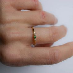 Natural Emerald-Pearl Dainty Ring, May Birthstone, Green Stone Ring, Pearl Ring, Birthday Gift Ring, Promise Ring, Gold Ring, Gift Ring Item Detail Material : 14K Gold , Stone Metal : 14K Solid Gold  Stone : Emerald & Pearl Size : 3mm & 2mm Shape: Round  Finish : 14k Yellow gold , 14k Rose gold , 14k White gold  Occasion:- Christmas Gift Ring, Mother's Day Gift, Valentine's Day Gift Ring, Lover gift Ring, Heart gift Ring, Promise Ring, Proposal Ring, Couple's Gift Ring, Anniversary Gifts Quality:- very order is processed timely and workmanship for each piece is done the best, because we believe customer's trust is worth our business. "The best way to predict the future is to create it" Contact Us:- Please Feel Free to contact us 24*7 to discuss for any order Express Shipping If you want ex Dainty Pearl Promise Ring With Birthstone, Dainty Pearl Birthstone Promise Ring, Pearl Stackable Rings For Anniversary, Fine Jewelry Pearl Ring With Birthstone For Anniversary, Open Pearl Ring With Birthstone For Promise, Pearl Birthstone Open Ring For Promise, Pearl Birthstone Open Ring, Dainty Birthstone Pearl Ring As A Gift, Dainty Pearl Birthstone Ring For Anniversary