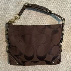 Like Brand New. No Defects. Authentic Coach Bag. Brass Finishes Big Logos On-the-go Shoulder Bag With Branded Hardware, Coach Hobo Tote Bag With Branded Hardware, Brown Rectangular Hobo Bag With Branded Hardware, Pink Coach Purses, Brown Coach Purse, Barrel Bag, Bags Coach, Black Leather Bags, Navy Leather