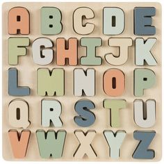 wooden letters and numbers are arranged in the shape of magnets