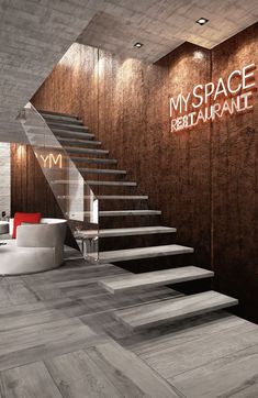 the entrance to my space restaurant with stairs leading up to it's reception area