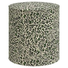 a green and white leopard print stool