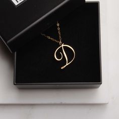 "D Initial Necklace - Timeless cursive \"D\" initial gold pendant - Personalized, Monogram jewelry for women - Vintage inspired font. Delicate \"D\" initial. Perfect every day necklace. Lovely gift for your self, sister, bridesmaids, new mom. Convo me if you would like to customize the length of the chain. The possibilities are endless. Pendant: Base metal is brass and 16K gold plated. Chain is 18 inches, gold filled. (if you would like a longer or shorter chain, please contact us to customize i Modern Gold Initial Necklace For Anniversary, D Initial Necklace, Short Gold Necklace, Every Day Necklace, Lovely Letter, D Initial, Letter Pendant Necklace, Initial Necklace Gold, Monogram Jewelry