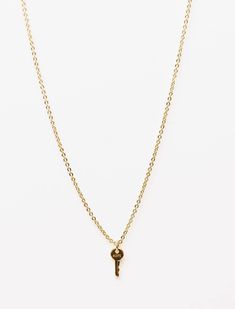 Hope Mini Key Necklace by The Giving Keys Gold 16" chain with a 2" extender Lobster clasp closure Chain features a matching logo tag and mini key measuring .25” x .5” Gold Charm Necklaces With Adjustable Chain For Everyday, Gold Charm Necklace With Adjustable Chain For Everyday, Classic Jewelry With Keys For Gifts, Everyday Gold Necklace With Logo Charm, Metal Charm Necklaces With Logo Charm As Gift, Gift Chain Necklace With Logo Charm, Metal Chain Necklace With Logo Charm For Gift, Pendant Chain Necklace With Logo Charm As Gift, Metal Chain Necklace With Logo Charm As Gift