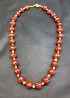 It's Beautiful Handmade Vintage Agate  Beads Gemstone With Gold Gulding Carved Beads in the Middle of Necklace Its Beautifully Done Necklace from Mughal Empire Time Its Good Quality Agate Stone Necklace Material Gold Gulding Gemstone Agate  Length 56cm Spiritual Carnelian 8mm Bead Jewelry, Spiritual Carnelian Beads Jewelry 8mm, Spiritual Carnelian 8mm Beaded Jewelry, Spiritual Carnelian Jewelry With 8mm Beads, Carnelian 8mm Beads Jewelry, Elegant Carnelian Beaded Necklace With Round Beads, Spiritual Polished Round Bead Jewelry, Spiritual Polished Round Beads Jewelry, Spiritual Style Polished Round Beads Jewelry