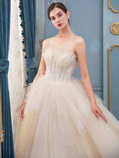 A-line Tulle Beaded Wedding Dresses Sleeveless Floor Length With Train Size Chart Size Bust Waist Hips Hollow to Floor US 00 / UK 0 / EU 28 78 58 84 135 US 0 / UK 2 / EU 30 81 62 88 140 US 2 / UK 6 / EU 32 83 65 91 147 US 4 / UK 8 / EU 34 85 68 93 147 US 6 / UK 10 / EU 36 88 70 96 150 US 8 / UK 12 / EU 38 90 72 98 150 US 10 / UK 14 / EU 40 93 75 101 152 US 12 / UK 16 / EU 42 97 79 105 152 US 14 / UK 18 / EU 44 100 83 109 155 US 16 / UK 20 / EU 46 104 86 112 155 If you choose MADE TO MEASURE. We will communicate with you by email. please pay attention to your mailbox (including your spam folder).