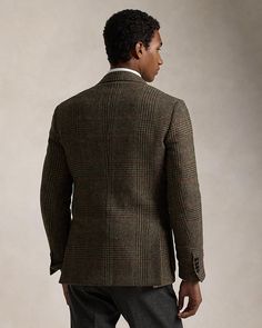 Find RALPH LAUREN Rl67 Russel Tailored Fit Tweed Jacket on Editorialist. About The Brand From an unconventional tie to one of the most iconic heritage brands of all time: Ralph Lauren splashed onto the scene in 1967 with a line of ties named Polo, nodding to the designer's love for the sport. A year later, the New York native expanded Polo from ties to a full menswear collection, offering classic American designs in fresh fabrications. In 1970, the designer reached another milestone and this tim Classic Ralph Lauren Tweed Jacket For Business, Classic Ralph Lauren Wool Tweed Jacket, Timeless Ralph Lauren Outerwear For Work, Ralph Lauren Wool Tweed Jacket For Work, Luxury Ralph Lauren Outerwear, Timeless Long-sleeve Ralph Lauren Outerwear, Classic Ralph Lauren Winter Tweed Jacket, Ralph Lauren Wool Blazer With Welt Pockets, Ralph Lauren Formal Tweed Jacket For Fall