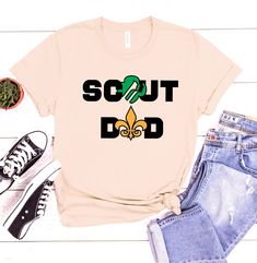 Celebrate fatherhood with this Scout Dad T-Shirt! Perfect for dads who embody the spirit of scouting, this t-shirt is both comfortable and stylish. Made from high-quality cotton, it’s ideal for everyday wear or special occasions. Features: 100% soft cotton fabric Durable print quality Perfect for casual wear or special events This t-shirt makes a great gift for Father's Day, birthdays, or any special occasion. With the Scout Dad T-Shirt, dads can enjoy both comfort and style. Order now and bring