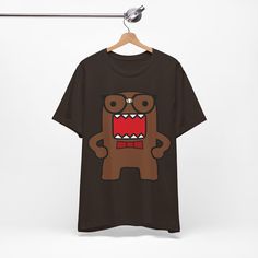 Unisex Nerd Domo Kun Tee - Emo Scene Style Shirt - Vintage Domo Face 2000's Fashion Hot Topic This classic unisex jersey short sleeve tee fits like a well-loved favorite. Soft cotton and quality print make users fall in love with it over and over again. These t-shirts have-ribbed knit collars to bolster shaping. The shoulders are tapered for a better fit over time. Dual side seams hold the garment's shape for longer.  .: Made with 100% Airlume combed and ring-spun cotton, a lightweight fabric (4.2 oz/yd² (142 g/m that is easy to layer, breathable. Perfect for active and leisure wear.  .: The retail fit that is perfect for casual and semi-formal settings. The crew neckline adds a classic, neat style that's perfect for accessorizing. .: Bella+Canvas manufactures all its products in the US an Emo Style 2000s, Scene Shirts, Domo Kun, Scene Style, Shirt Drawing, Scene Fashion, Emo Fashion, Emo Scene, Neat Style