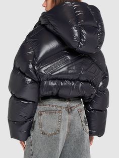 Non-detachable hood. Front snap button and concealed zip closure. Back embossed logo. Two front pockets. Down feather filling. Model is wearing a size38 Designer Hooded Puffer Jacket With Padded Collar, Designer Winter Puffer Jacket With Detachable Hood, Designer Down Puffer Jacket With Detachable Hood, Designer Quilted Hooded Puffer Jacket, Luxury Hooded Puffer Jacket With Zipper Closure, Luxury Fall Puffer Jacket With Pockets, Luxury Down Outerwear With Detachable Hood, Designer Hooded Outerwear For Cold Weather, Luxury Nylon Outerwear With Detachable Hood