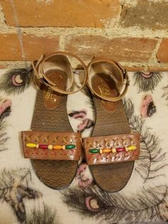 "++ KALLI SANDALS ++ Amazing genuine leather sandals Made in Brazil Woven leather and bead work Adjustable buckle ankle strap Open toe Women's size 7 In wonderful, gently used condition ✂ - - - Measurements: Heel to toe: 9\" Ball: 3.25\" Let's be friends! Instagram @TheGirlSaidYes @Covet.Vintage https://www.facebook.com/TheGirlSaidYesVintage 29" Vintage Leather Sandals For Beach, Vintage Leather Sandals For The Beach, Vintage Leather Sandals For Vacation, Vintage Leather Huarache Sandals For Beach, Vintage Huarache Sandals For Summer Beach, Vintage Leather Huarache Sandals For Summer, Beaded Ankle, Genuine Leather Sandals, Friends Instagram