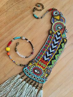 Asymmetrical Beadwork Necklace with Tassels Tribal by perlinibella Makramee Diy, Beadwork Necklace, Beautiful Beadwork, Boho Bracelet, Bracelet Boho, Heishi Beads, Necklace Statement, Necklace Boho, Tapestry Weaving