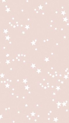 a pink background with white stars on it