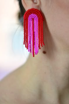 "Statement boho waterfall cascade chandelier tassel earrings Bohemian fringe Gold white blue black Red hot pink dangle beaded jewelry! They will be a wonderful accessory for any of your style! ♡I promise that you will always be in the spotlight with such earrings!♡ Size: length - 7.cm (2.8 inches) width - 3 cm (1.2 inches) ❤ CUSTOM ORDERS It is ABSOLUTELY HANDMADE . So if you like this item in a different color or size, send me a message please. I will send you a link for a \"custom order\" and Dangle Tassel Chandelier Earrings, Fringe Dangle Chandelier Earrings, Bohemian Dangle Tassel Earrings For Party, Red Beaded Fringe Drop Earrings, Trendy Fringe Jewelry Gift, Trendy Fringe Jewelry As Gift, Trendy Fringe Jewelry For Gifts, Trendy Fringed Jewelry As Gift, Pink Dangle Tassel Earrings With Fringe