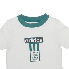 Item is in used condition. Small mark to bottom of t-shirt. >Size: UK 10 >Armpit To Armpit: 16" >Armpit To Cuff: 3" >Collar To Hem: 18" Casual T-shirt With Three Stripes Branding For Sports Season, Casual Green T-shirt With Adidas Logo, Sporty Logo T-shirt For Sports, Casual Green T-shirt With Logo, Short Sleeve Logo T-shirt In Athleisure Style, Sporty Logo Tops For College, Sports Crew Neck Top With Logo, Sports Tops With Logo And Crew Neck, Athleisure T-shirt With Sports Logo