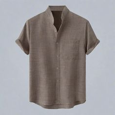 Breathable Comfort Meets Timeless Style Expertly crafted with a relaxed fit, this breathable linen blend shirt is perfect for any occasion. Here's why you'll love it: Cool Comfort: The linen blend fabric offers superior breathability, keeping you cool and comfortable all day long. Relaxed Fit for All-Day Ease: The comfortable, relaxed fit allows for a laid-back look without sacrificing style. Versatility You Crave: Dress it down with jeans for a casual day out, or elevate your look by pairing it Spring Relaxed Fit Ramie Shirt, Spring Relax Fit Ramie Shirt, Casual Beige Ramie Tops, Casual Cotton Shirt In Flax Color, Brown Linen Summer Shirt, Beige Linen Summer Shirt, Relaxed Fit Cotton Shirt In Flax Color, Flax Cotton Shirt With Relaxed Fit, Relaxed Fit Linen Shirt In Solid Color