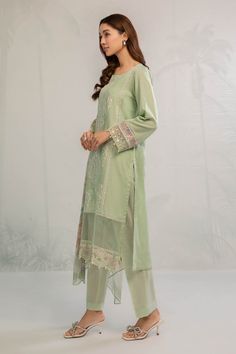 Sea Green Embroidered Pakistani Salwar Kameez with Dupatta Salwar Suit in Classical Dobby Lawn that is an elegant masterpiece that will give you a stunning look with a contrast of sea green color. Hand-crafted embellishments and threads make this kameez and trousers style Dress an epitome of beauty and your foremost priority for the functions. Embroidered Kameez: The beautiful kameez is gracefully Hand embellished, with floral designs. Hand-crafted details of motifs and sequins enhance the charm Eid Cambric Sets With Intricate Embroidery, Bollywood Style Sets With Intricate Embroidery On Cambric, Bollywood Style Sets With Intricate Embroidery In Cambric, Bollywood Style Cambric Sets With Intricate Embroidery, Semi-stitched Pista Green Kurta With Resham Embroidery, Designer Wear Pista Green Kurta, Pista Green Lawn Suit With Zari Work, Straight Kurta, Pista Green Straight Kurta With Intricate Embroidery, Unstitched Pista Green Kurta With Intricate Embroidery