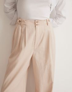 Made of a drapey TENCEL lyocell and linen blend, these wide-leg pants have sailor-inspired button tabs at the waist.Full-length inseam that hits right above the ground when worn with heels.12 3/4" rise, 23" leg opening, 30" inseam. Petite inseam: 27 1/2"; tall inseam: 33".48% TENCEL lyocell/33% cotton/19% linen.Do Well: TENCEL lyocell fibers are derived from sustainable wood sources in a closed-loop process; for each piece made at the Fair Trade Certified factory, we contribute to a Community De Camel Sweater Dress, Cream Pants, Outfits Petite, Fall Outfits For Work, Half Zip Sweaters, Wide Leg Pant, Madewell Denim, Women Pants Casual, Cropped Cardigan