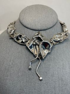 Gorgeous abstract, modernist handmade, one of a kind necklace. Made by Marksz out of Palm Beach. Lovely crinkle design. Marksz and his wife have been making one of a kind jewelry for over 30 years. 46.9 grams. 18 inches neck length. Marked DMW. Acid tested for sterling. Mint condition. Contemporary Silver Jewelry With Artistic Design, Contemporary Sculptural Jewelry For Formal Occasions, Unique Hand Cast Silver Necklace, Artisan Hand Cast Metal Necklaces, Contemporary Sterling Silver Necklaces, Handmade Sterling Silver Contemporary Necklace, Artistic Necklaces With Unique Design, Formal Sculptural Silver Jewelry, Contemporary Handmade Necklace