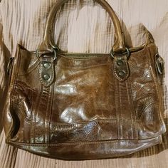 This Is A Dark Chocolate Brown Handbag. Comes With Crossbody Strap There Is Minor Wear And Tear But Still Great Condition. Brown Satchel With Silver-tone Hardware, Brown Vegetable-tanned Crossbody Satchel, Distressed Brown Everyday Bag, Rectangular, Distressed Brown Leather-lined Satchel Bag, Frye Bags, Brown Crossbody Bag With Silver-tone Hardware, Dark Chocolate Brown, Brown Handbag, Chocolate Brown