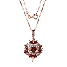 Rose Gold-Plated Garnet and White Topaz Cluster Pendant with Chain  This gorgeous, garnet cluster pendant is sure to add an elegant touch to any ensemble. It features rich, red garnets embellished with sparkling white topaz accents in a rose gold-plated, sterling silver setting.       Pendant approx. 32.8mm x 18.9mm      Chain approx. 18"L     Stamped .925; rose gold-plating     Star-shaped cluster pendant features heart- and marquise-cut red garnets and round and pear-cut white topaz     Cable Elegant Garnet Pendant Necklace, Elegant Garnet Necklaces For Weddings, Elegant Garnet Necklace For Wedding, Elegant Burgundy Garnet Necklaces, Elegant Burgundy Jewelry For Valentine's Day, Garnet Heart, Color Bands, Pendant With Chain, Cluster Pendant