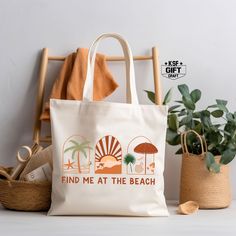 "Find Me At The Beach Tote Bag, Cute Summer Tote Bag, Beach Lovers Gift, Summer Vibes Totes, Summer Gift, Cool Summer Bag, Beach Shoulder Bag Personalized tote bags are perfect for yourself, Your Company, or as a gift! These are also the ideal bride's, Bridal Shower, Baby Shower, Birthday Party, gift, or proposal gift. PRODUCT *Measurements15\"L x 16\"H *12 oz./yd² (US), 20 oz (CA), 100% heavy cotton canvas *20\" canvas webbed handles * 9\" handle drop *Made from Heavy duty cotton canvas fabric Beige Canvas Bag For Beach Vacation, Beige Summer Canvas Bag For Beach Season, Summer Beige Canvas Bag For Beach, Beige Canvas Bag For Beach Season, Beige Canvas Bag For Summer, Summer Bucket Canvas Bag For Beach, Summer Canvas Bucket Bag For Beach, Large Capacity Canvas Bag For Beach Vacation, Eco-friendly Canvas Shoulder Bag For Beach