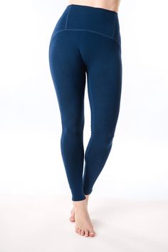 Gia Legging: Description: 25-26"" inseam • No front center seam • High Rise Rear waistband zipper pocket with beautiful waistline detail Ethical Fashion • Mindful Movement Active Yoga Wear Logo reflector heat transfer at center back waistband Biodegradable Packaging No hormone disruptors, No metals, 85% biodegradable The Sustainable Performance Fiber-Eco Air Tek™ Maximum Breathability Antibacterial Antifungal Hypoallergenic Thermodynamic UV Protection Quick Dry Sustainable + Renewable Odor Resis Navy Fitted Elastane Bottoms, Blue High-stretch Activewear With Elastic Waistband, Blue High Stretch Activewear With Elastic Waistband, Casual Compression Yoga Pants In Blue, High Stretch Blue Activewear With Elastic Waistband, Blue Comfort Stretch Yoga Pants, Blue Full-length Comfort Stretch Activewear, Blue Comfort Stretch Full-length Activewear, Blue Comfort Stretch Yoga Leggings